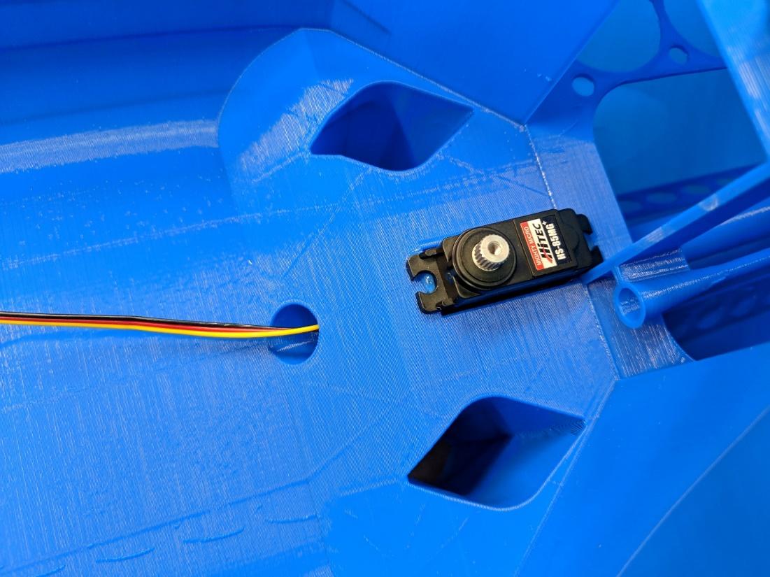 Elevator servo secured in the fuselage
