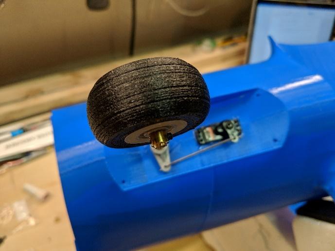 Nose wheel with shaft collars