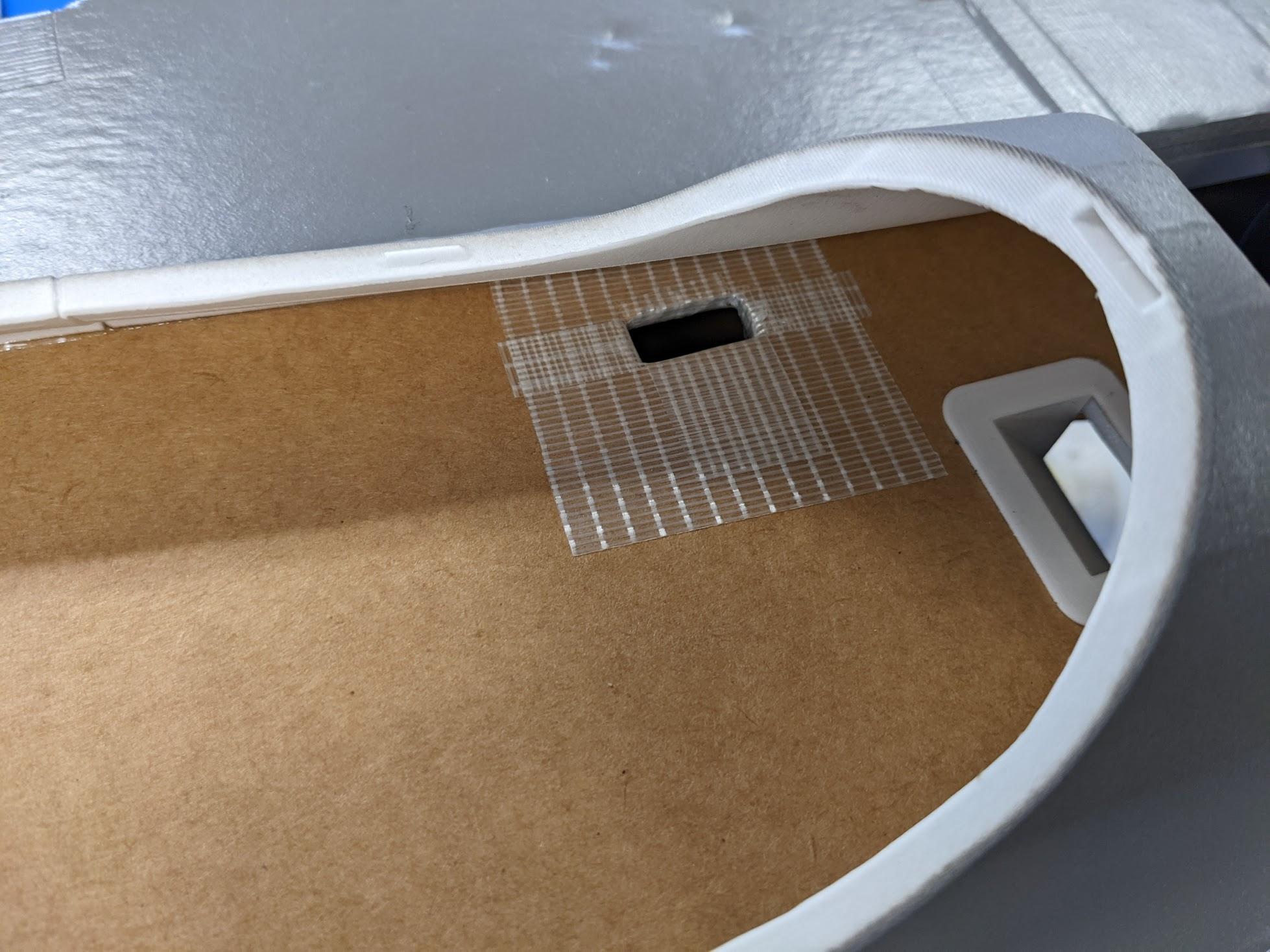 Battery connector hole cut