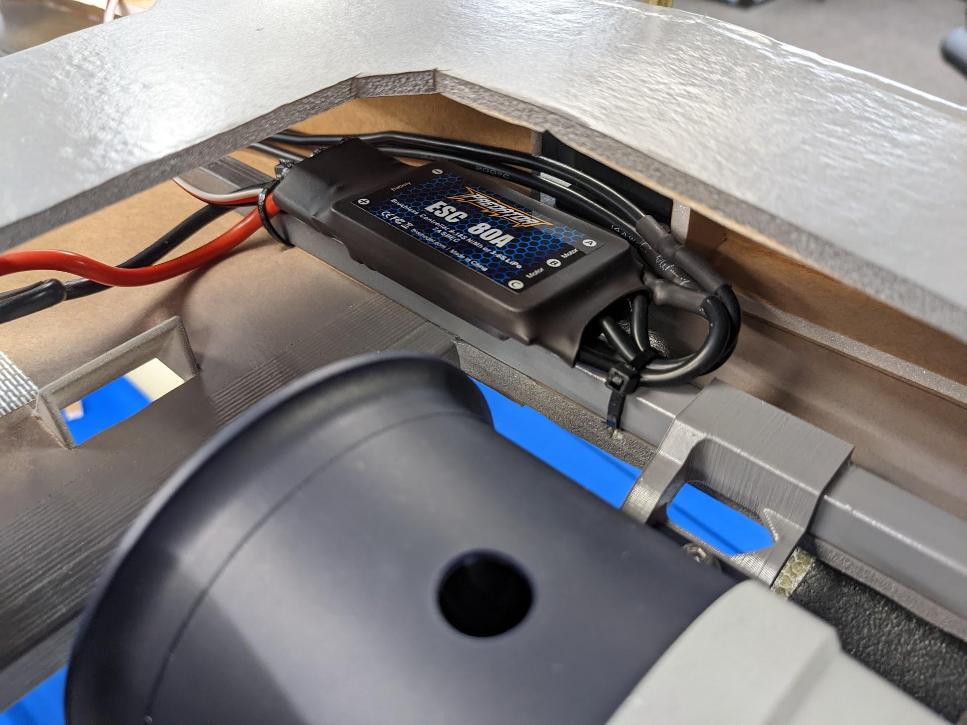 ESCs attached to the fuselage spars