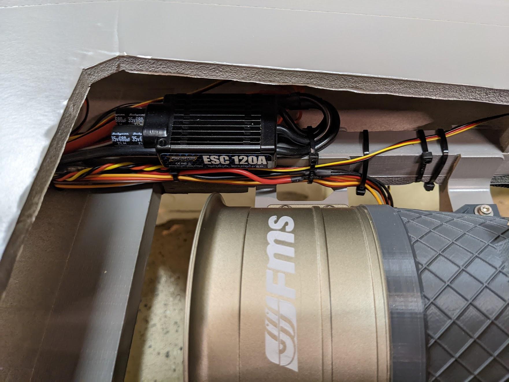 ESCs cable-tied to the fuselage spars
