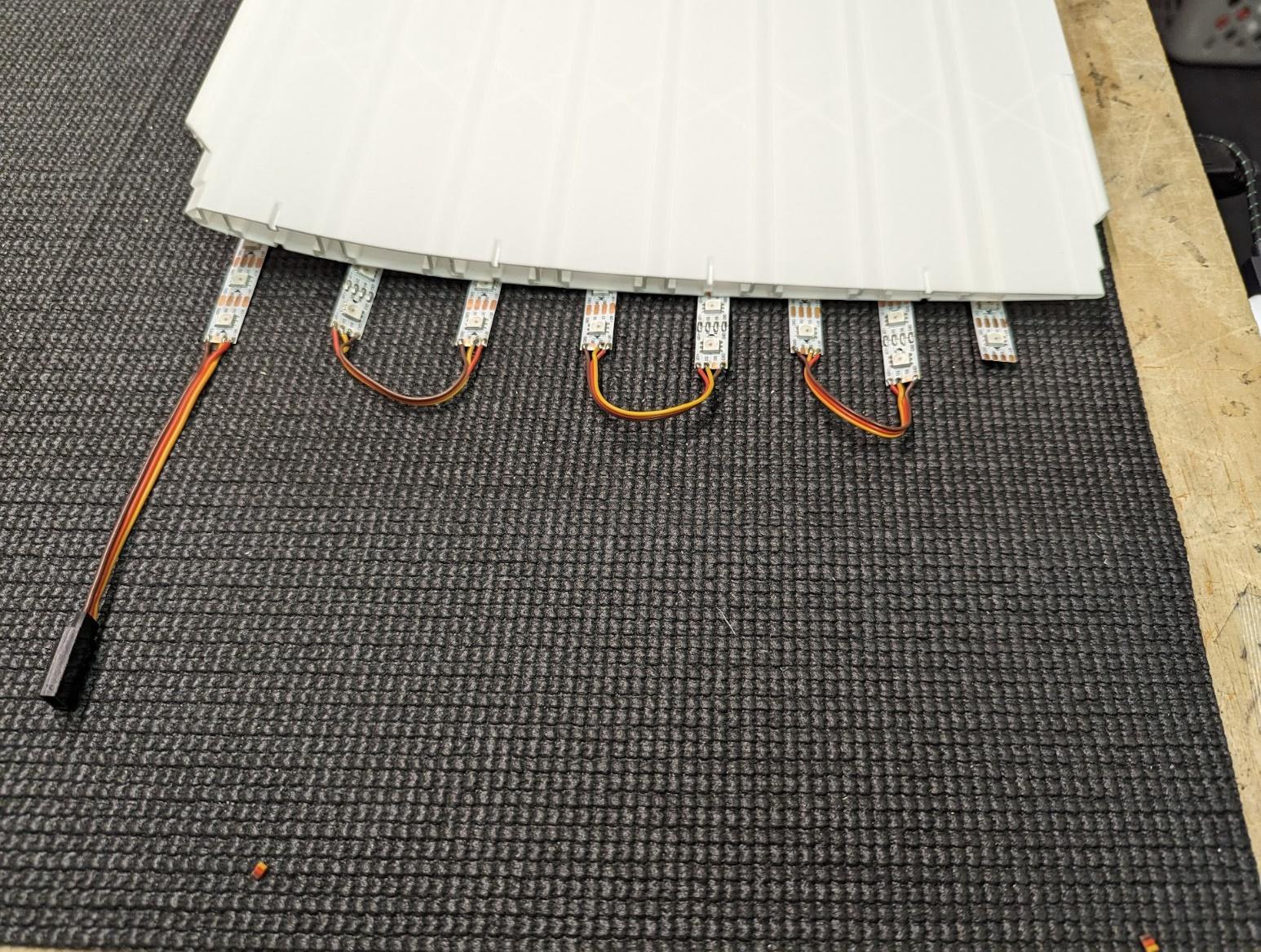 LED strips slid into the wing slots