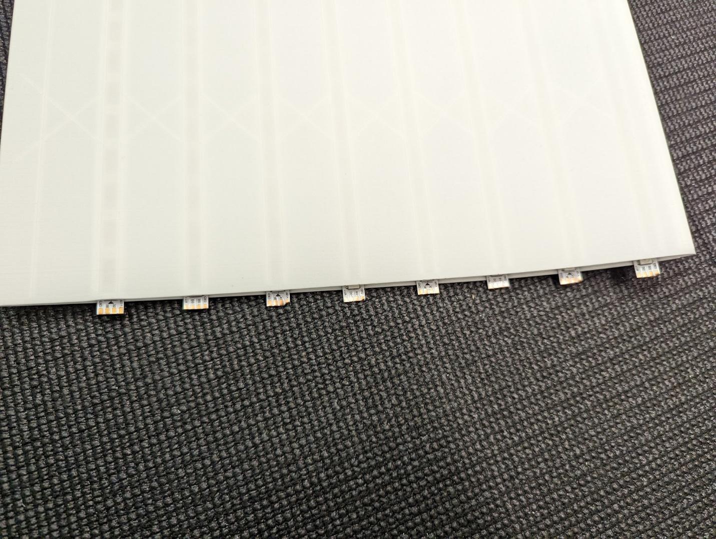 LED strips seated in the wing