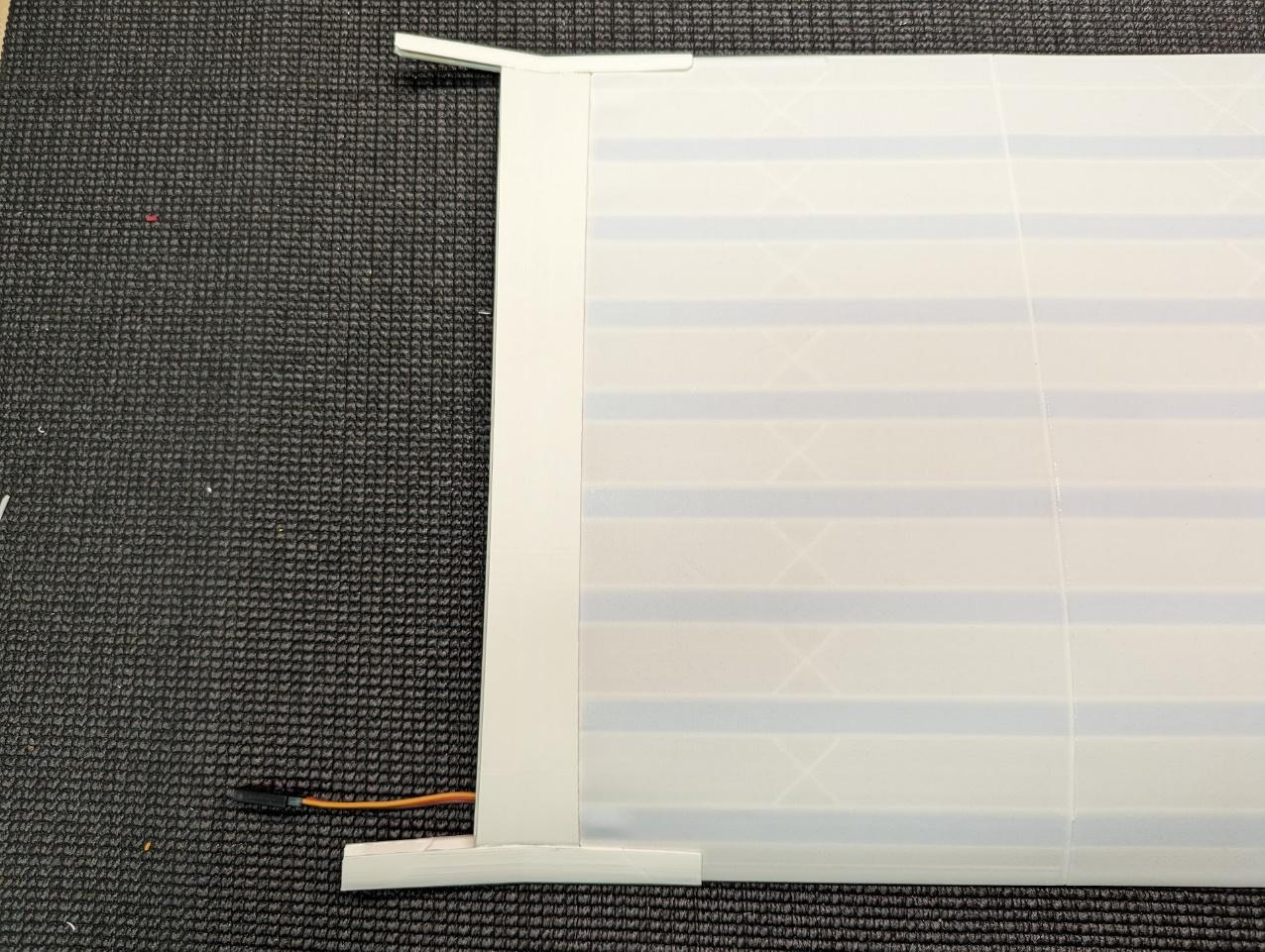 Glue applied to rods and wing skins