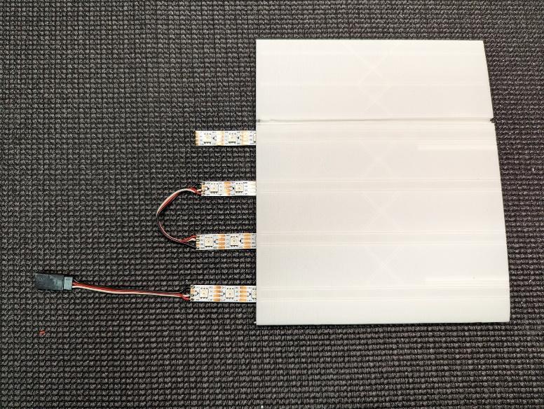 LED strips slid into the tail slots