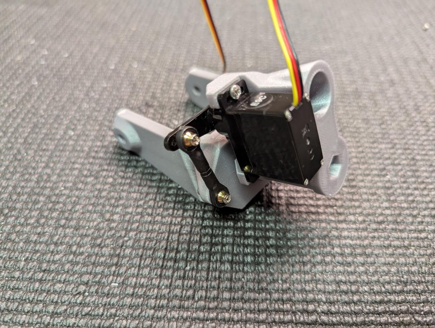 Nose steering servo secured