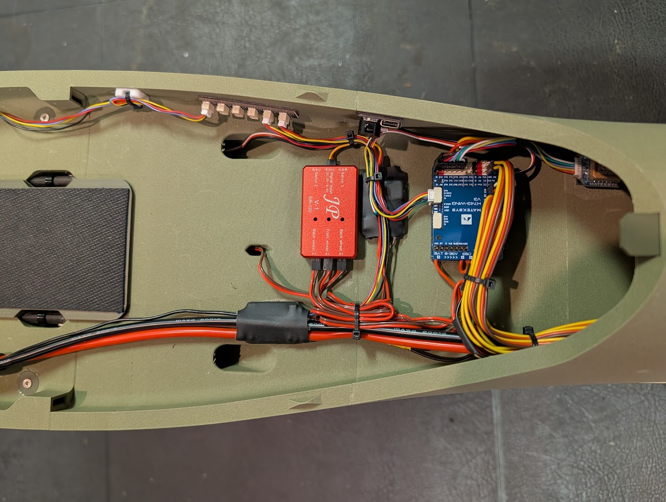 Flight controller arranged in the avionics area