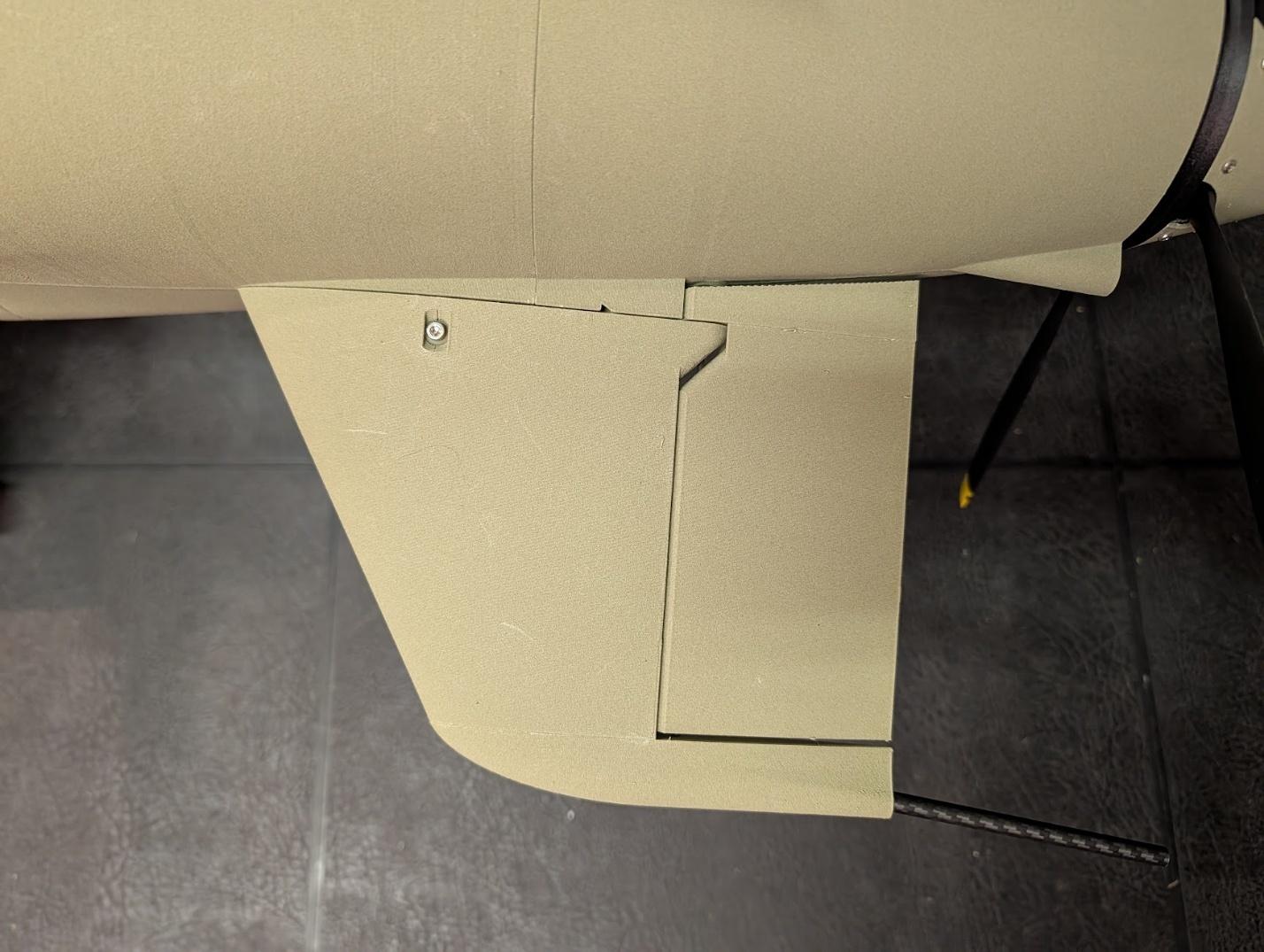 Ventral fin secured