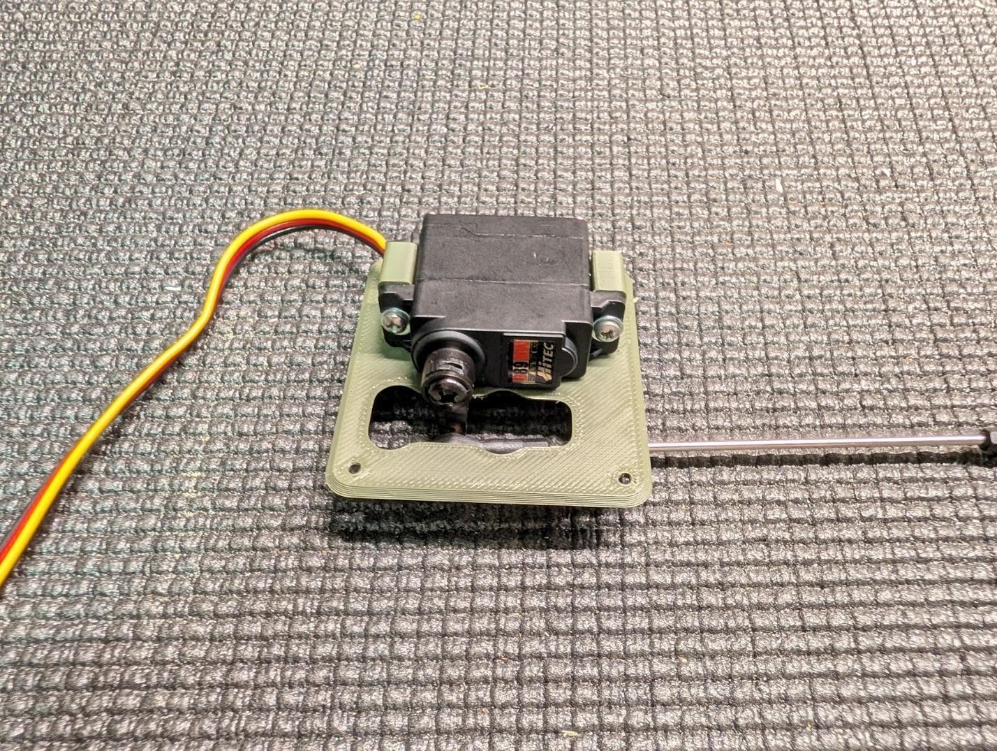 Aileron servo fastened to its mount
