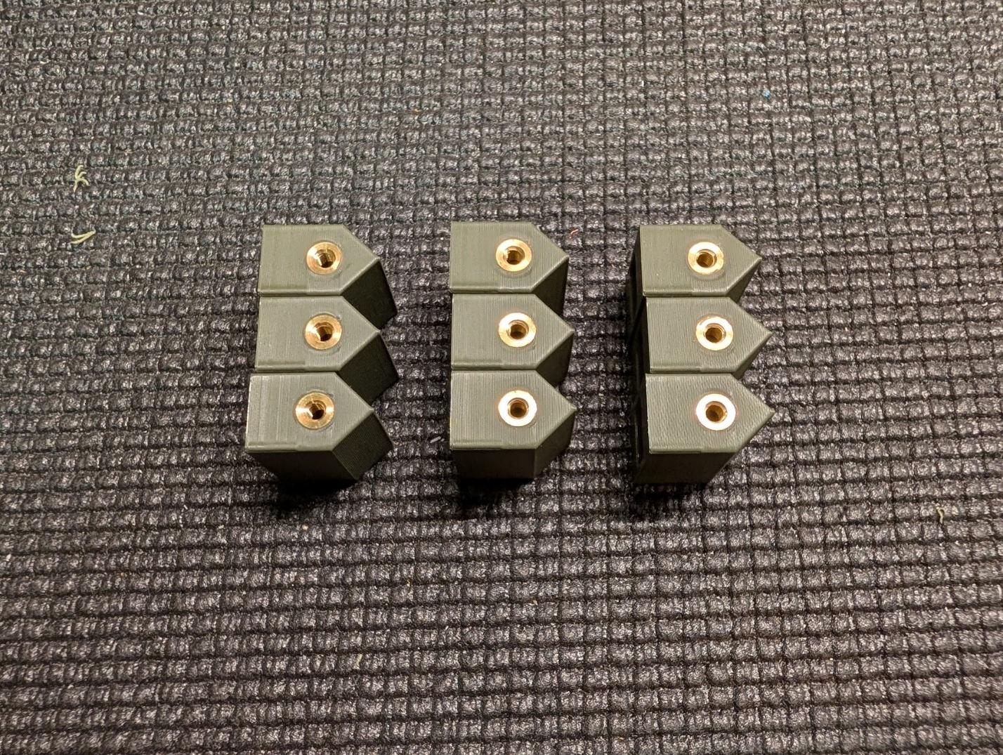 Threaded inserts in the bolt latch receptacles