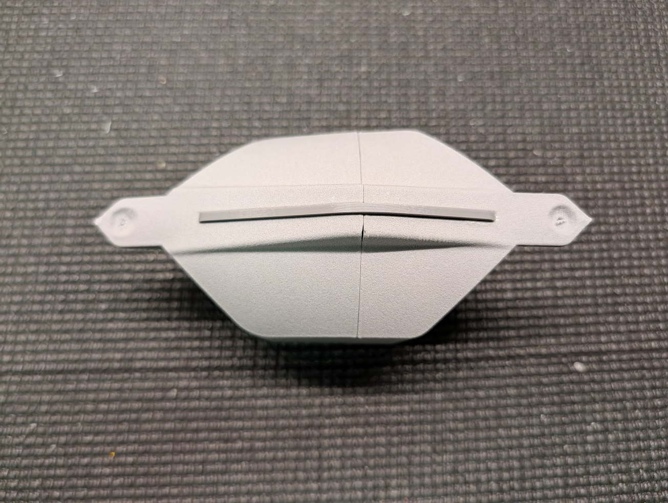 Fan hatch cover halves joined