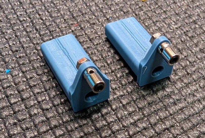 Pivot blocks with pushrod connectors