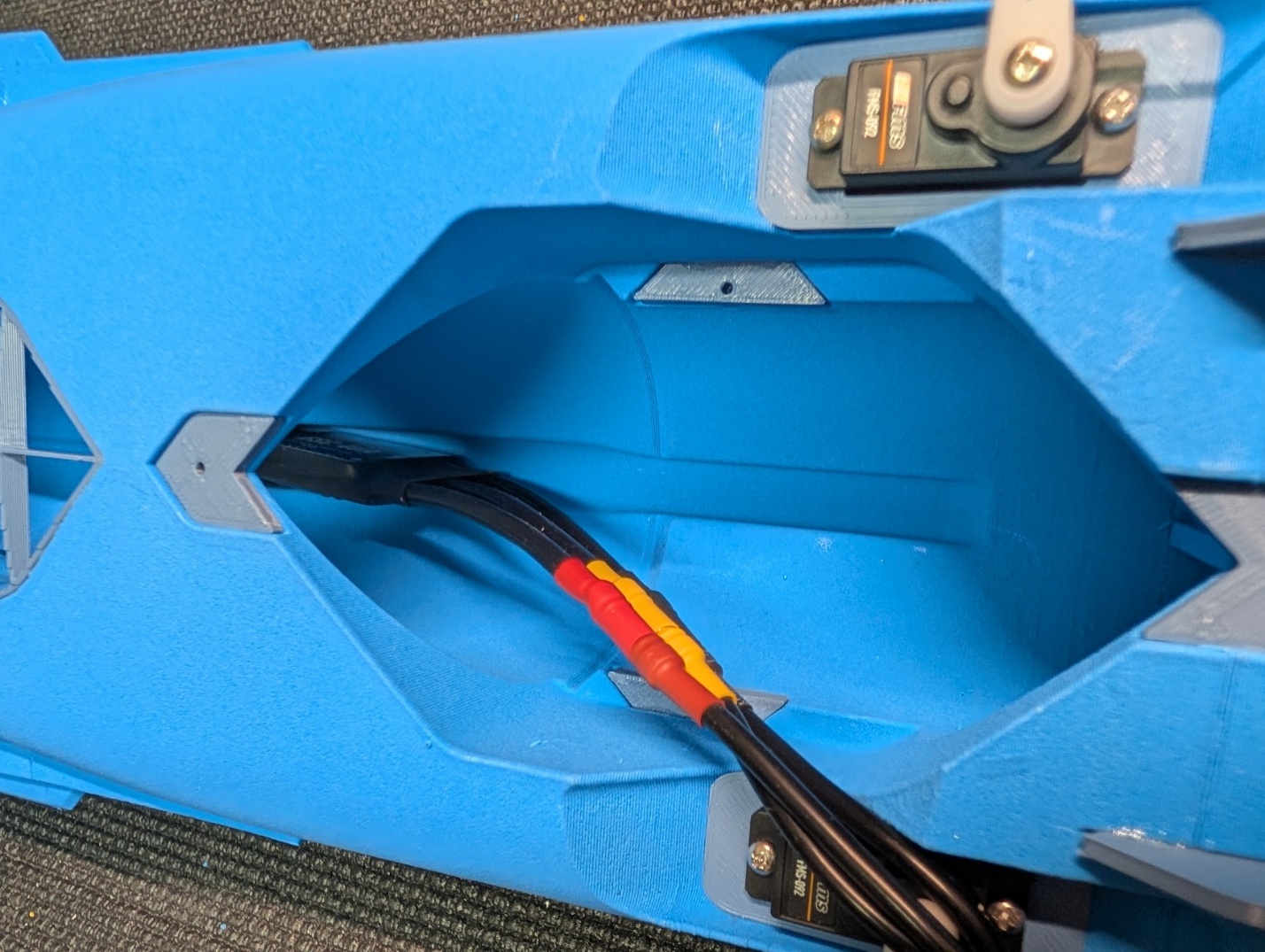 ESC and wiring fed into the fuselage channel