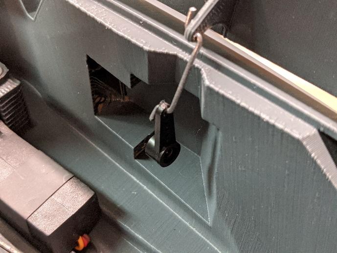 Pushrods inserted into the nose gear door control horns