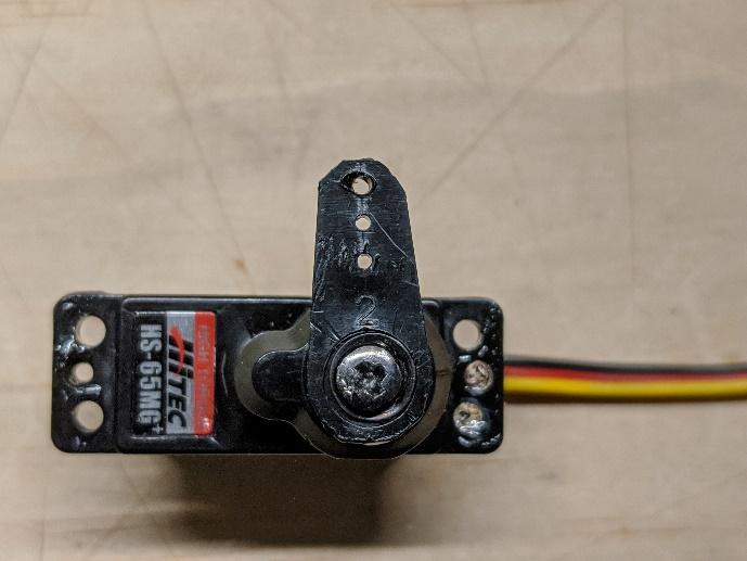 Control arm trimmed to length