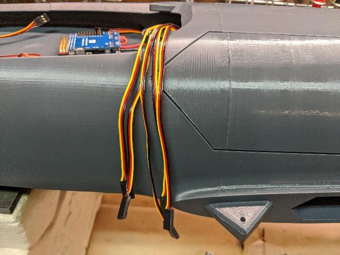 Extensions exiting into the avionics bay