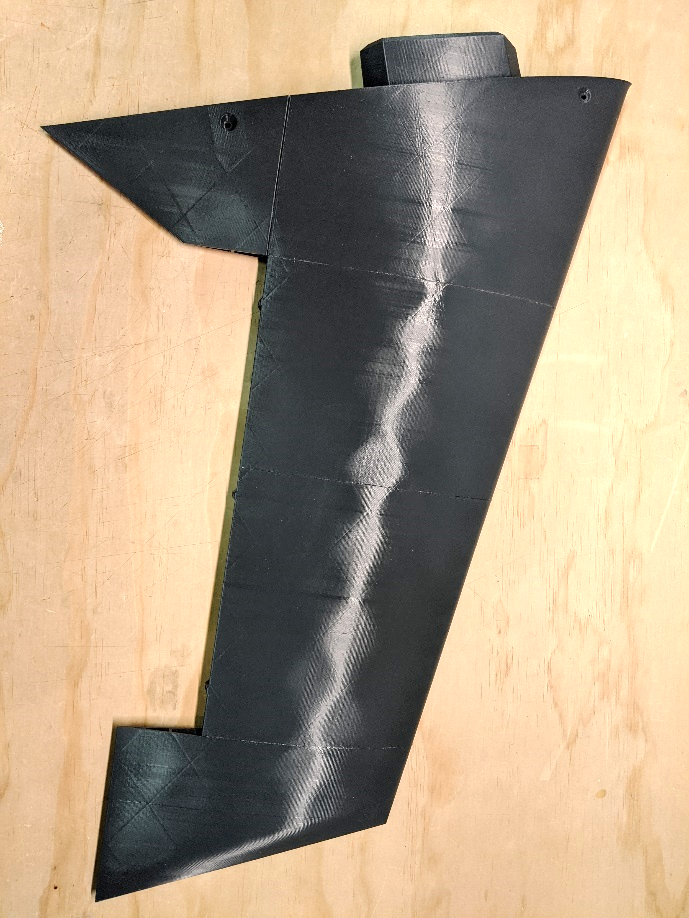 Inner and outer wing panels joined