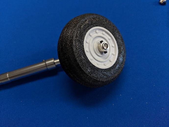 Main wheel installed with set screw collars