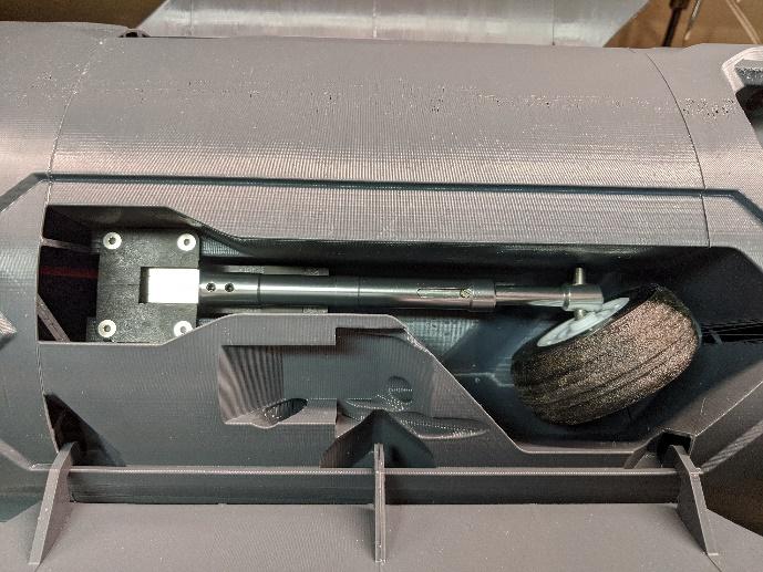 Main retract screwed in place